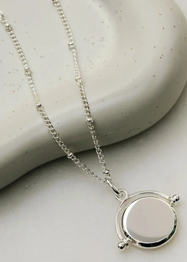 Orelia Faceted Disc Spinner Necklace - Silver | Necklaces