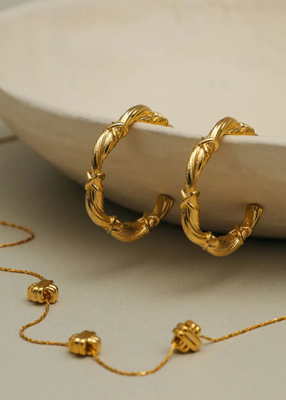 woven_twist_amp_cross_mid_1.webp Orelia Woven Twist & Cross Mid-Size Hoop Earrings | Earrings
